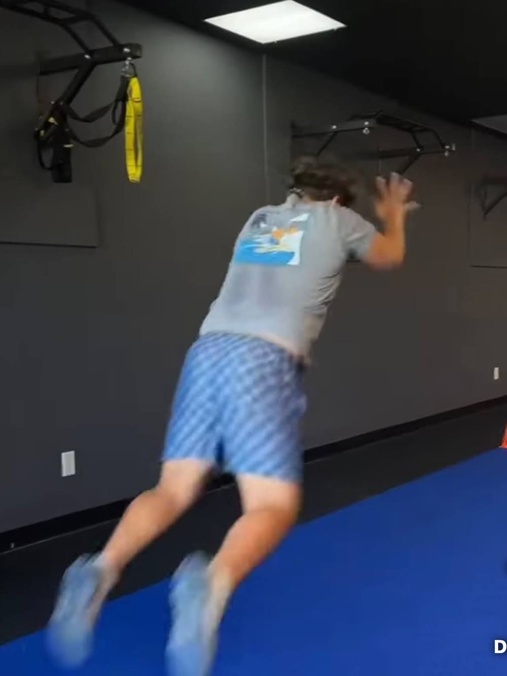 screenshot a teen student-athlete from lake highland prep performing power jump under expert supervision at darwin fitness to build speed and prevent injury for competitive sports